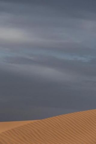 Blue sky brown dune