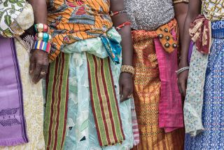 Colorful Procession Of African Women