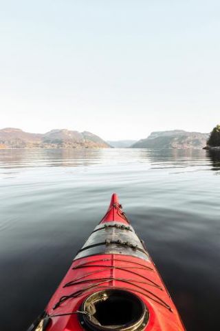 The Lone Kayak In Norway